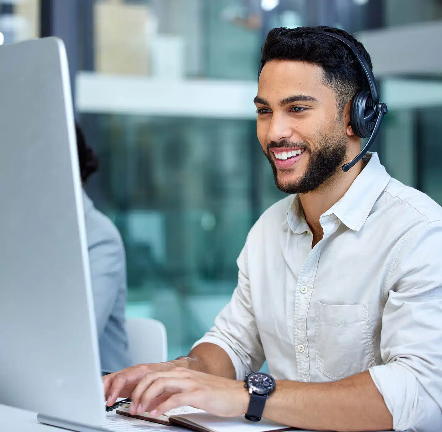 IT support specialist providing help desk services with a smile