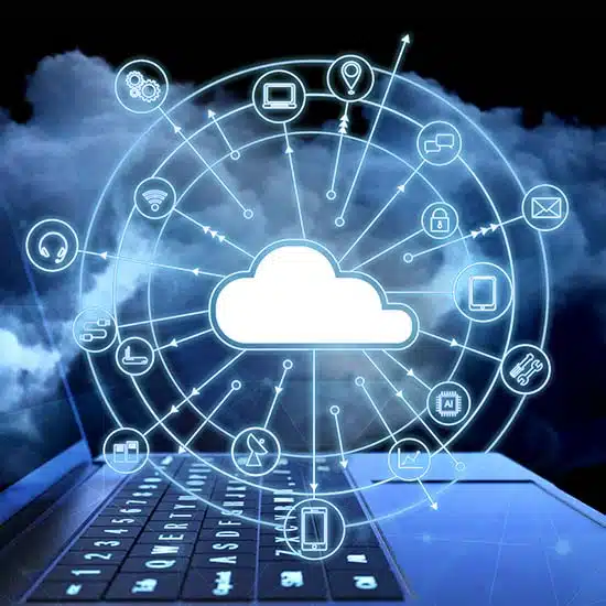 Laptop displaying a cloud computing concept, representing data and applications being migrated in the cloud.