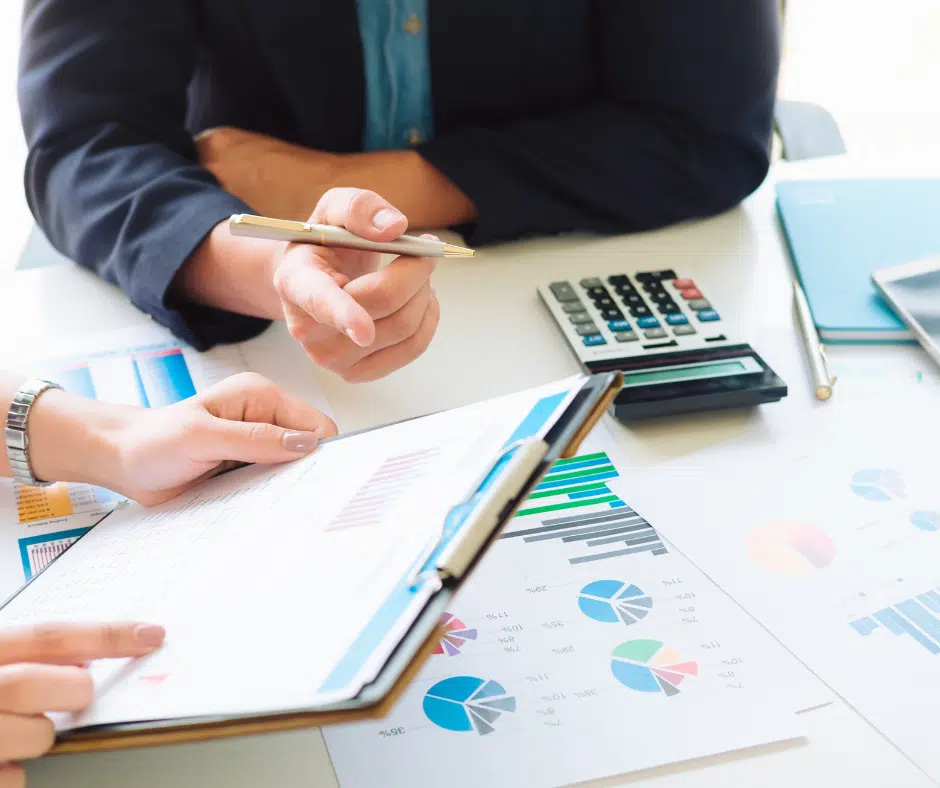 People working on strategic IT budgeting framework for aligning technology investments with business objectives.