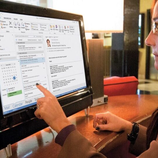 Woman working with email retention policies in Office 365