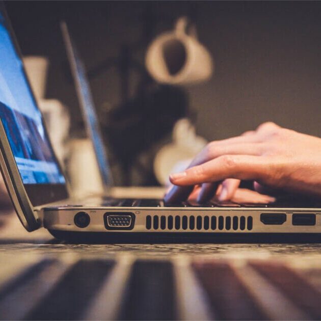 Man checking email on business computer
